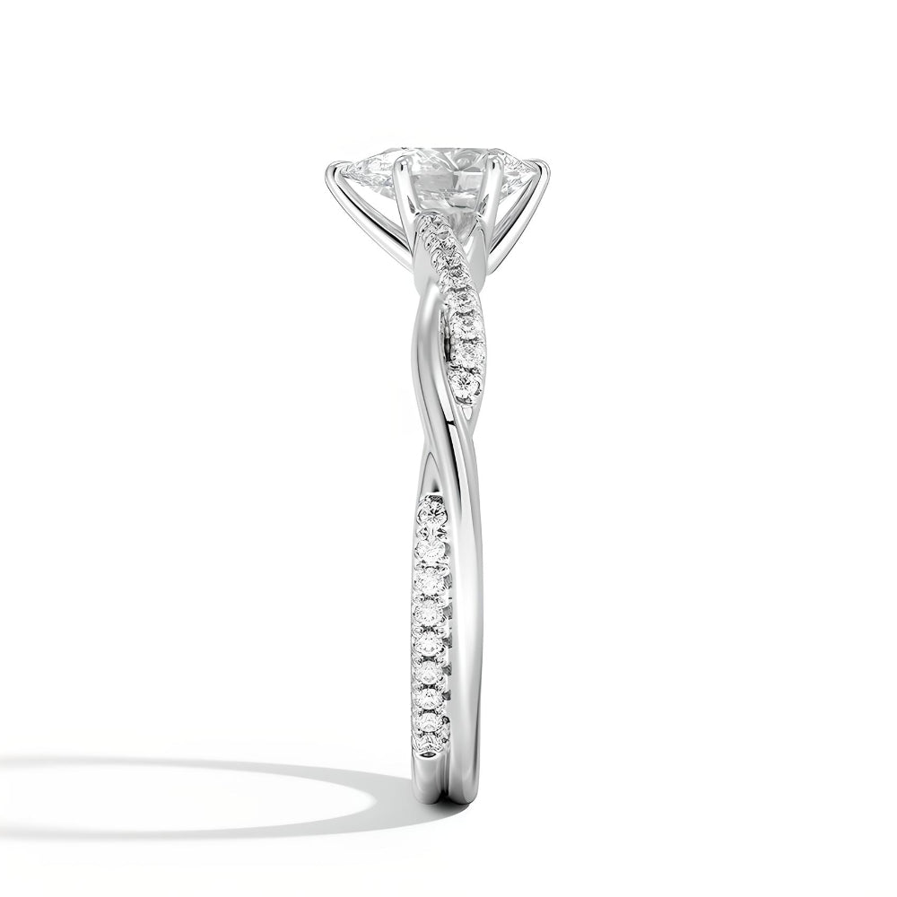 anillo de compromiso corte pera en estilo trenzado