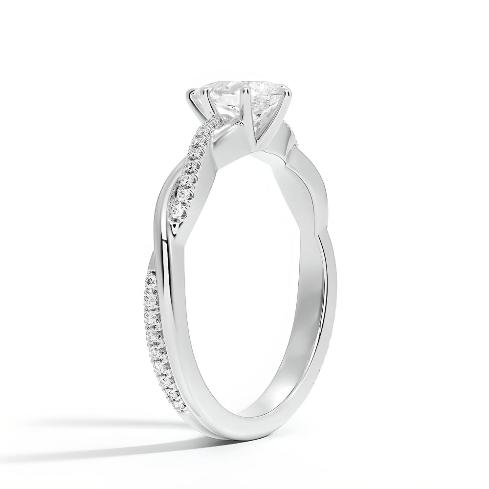 anillo de compromiso corte pera en estilo trenzado
